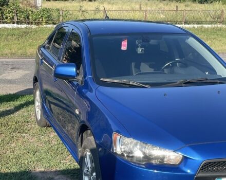 Синий Мицубиси Лансер, объемом двигателя 1.8 л и пробегом 228 тыс. км за 8300 $, фото 1 на Automoto.ua