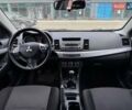 Синий Мицубиси Лансер, объемом двигателя 1.8 л и пробегом 317 тыс. км за 6500 $, фото 7 на Automoto.ua