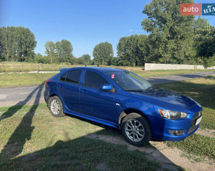 Синій Міцубісі Lancer, об'ємом двигуна 1.8 л та пробігом 223 тис. км за 9000 $, фото 7 на Automoto.ua