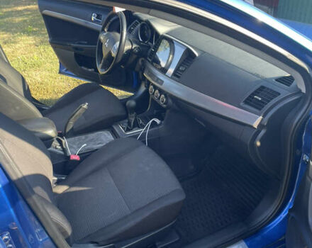 Синій Міцубісі Lancer, об'ємом двигуна 1.8 л та пробігом 223 тис. км за 9000 $, фото 14 на Automoto.ua