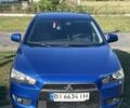 Синий Мицубиси Лансер, объемом двигателя 1.8 л и пробегом 228 тыс. км за 8300 $, фото 1 на Automoto.ua