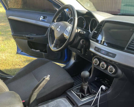 Синій Міцубісі Lancer, об'ємом двигуна 1.8 л та пробігом 223 тис. км за 9000 $, фото 13 на Automoto.ua