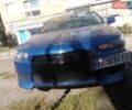 Синій Міцубісі Lancer, об'ємом двигуна 2 л та пробігом 197 тис. км за 8200 $, фото 3 на Automoto.ua