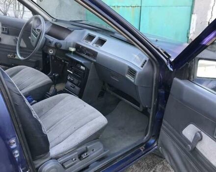 Синий Мицубиси Лансер, объемом двигателя 1.8 л и пробегом 322 тыс. км за 800 $, фото 3 на Automoto.ua