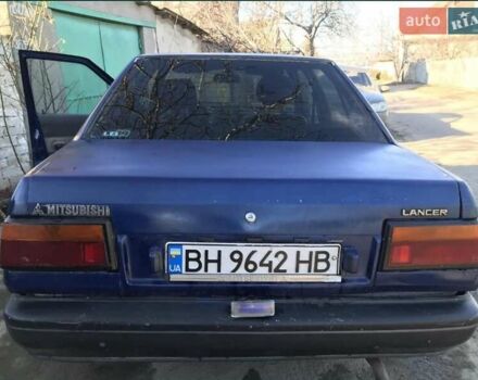 Синий Мицубиси Лансер, объемом двигателя 1.8 л и пробегом 322 тыс. км за 800 $, фото 1 на Automoto.ua