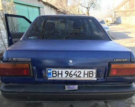 Синий Мицубиси Лансер, объемом двигателя 0 л и пробегом 322 тыс. км за 750 $, фото 1 на Automoto.ua