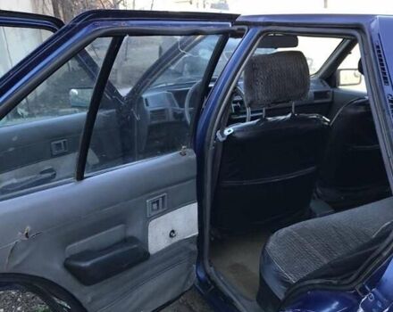 Синий Мицубиси Лансер, объемом двигателя 1.8 л и пробегом 322 тыс. км за 800 $, фото 2 на Automoto.ua