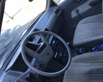 Синий Мицубиси Лансер, объемом двигателя 1.8 л и пробегом 322 тыс. км за 800 $, фото 5 на Automoto.ua