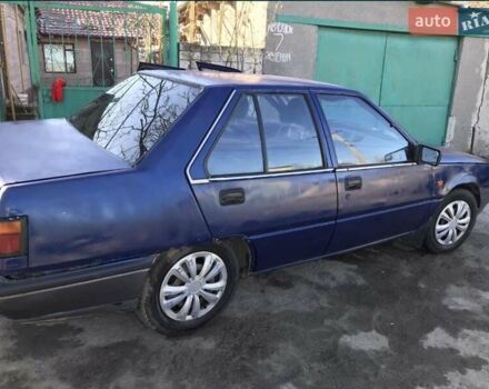 Синий Мицубиси Лансер, объемом двигателя 1.8 л и пробегом 322 тыс. км за 800 $, фото 6 на Automoto.ua