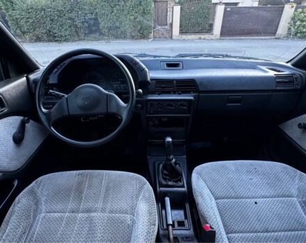 Синий Мицубиси Лансер, объемом двигателя 1.5 л и пробегом 300 тыс. км за 599 $, фото 13 на Automoto.ua