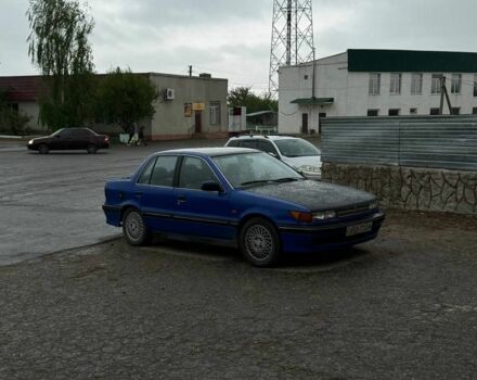 Синій Міцубісі Lancer, об'ємом двигуна 2 л та пробігом 37 тис. км за 850 $, фото 2 на Automoto.ua