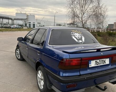 Синий Мицубиси Лансер, объемом двигателя 1.8 л и пробегом 245 тыс. км за 3200 $, фото 14 на Automoto.ua