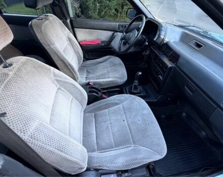 Синий Мицубиси Лансер, объемом двигателя 1.5 л и пробегом 300 тыс. км за 599 $, фото 12 на Automoto.ua