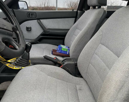 Синий Мицубиси Лансер, объемом двигателя 1.8 л и пробегом 245 тыс. км за 3000 $, фото 13 на Automoto.ua