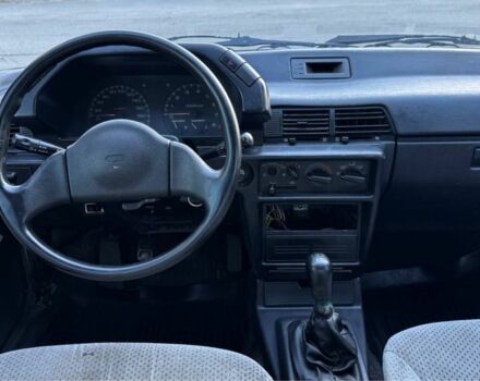 Синий Мицубиси Лансер, объемом двигателя 1.5 л и пробегом 300 тыс. км за 599 $, фото 10 на Automoto.ua