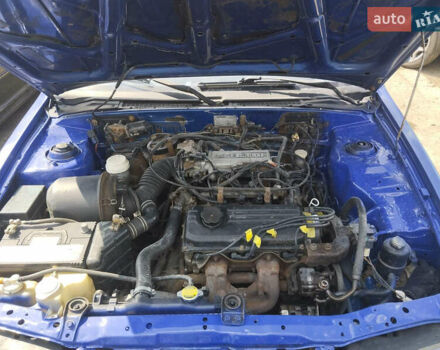 Синий Мицубиси Лансер, объемом двигателя 1.5 л и пробегом 300 тыс. км за 1300 $, фото 3 на Automoto.ua