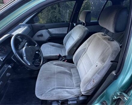 Синий Мицубиси Лансер, объемом двигателя 1.5 л и пробегом 300 тыс. км за 599 $, фото 17 на Automoto.ua