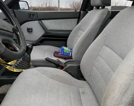 Синий Мицубиси Лансер, объемом двигателя 1.8 л и пробегом 245 тыс. км за 3200 $, фото 3 на Automoto.ua