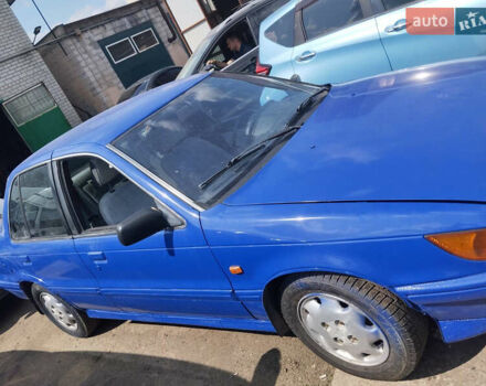 Синий Мицубиси Лансер, объемом двигателя 1.5 л и пробегом 300 тыс. км за 1300 $, фото 2 на Automoto.ua
