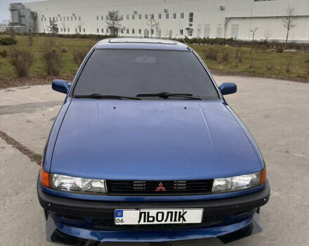 Синий Мицубиси Лансер, объемом двигателя 1.8 л и пробегом 245 тыс. км за 3000 $, фото 2 на Automoto.ua