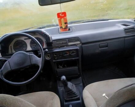 Синий Мицубиси Лансер, объемом двигателя 20 л и пробегом 380 тыс. км за 800 $, фото 4 на Automoto.ua