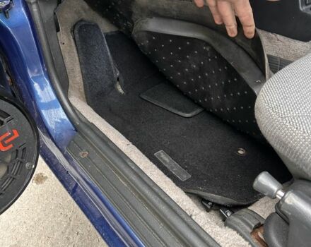 Синий Мицубиси Лансер, объемом двигателя 1.8 л и пробегом 245 тыс. км за 3200 $, фото 13 на Automoto.ua