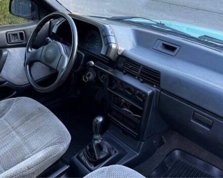 Синий Мицубиси Лансер, объемом двигателя 1.5 л и пробегом 300 тыс. км за 599 $, фото 16 на Automoto.ua