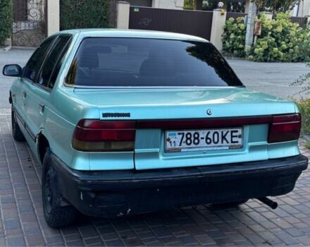 Синий Мицубиси Лансер, объемом двигателя 1.5 л и пробегом 300 тыс. км за 599 $, фото 7 на Automoto.ua