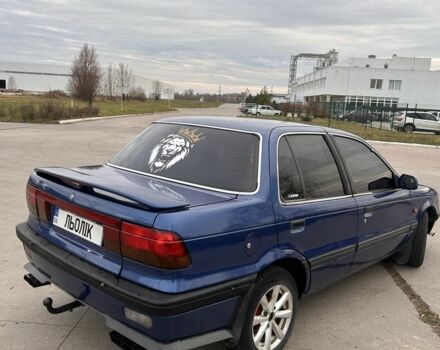 Синий Мицубиси Лансер, объемом двигателя 1.8 л и пробегом 245 тыс. км за 3200 $, фото 1 на Automoto.ua