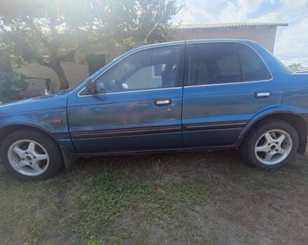 Синий Мицубиси Лансер, объемом двигателя 1.5 л и пробегом 450 тыс. км за 999 $, фото 4 на Automoto.ua