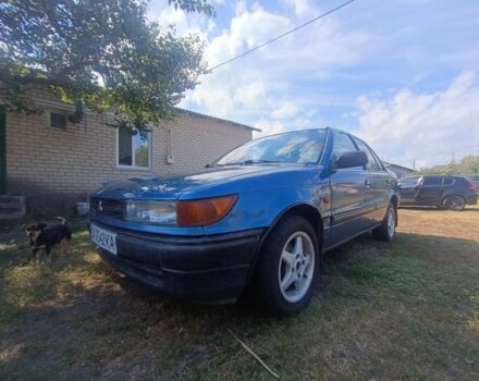 Синий Мицубиси Лансер, объемом двигателя 1.5 л и пробегом 450 тыс. км за 999 $, фото 2 на Automoto.ua