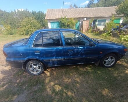 Синий Мицубиси Лансер, объемом двигателя 1.5 л и пробегом 450 тыс. км за 999 $, фото 3 на Automoto.ua