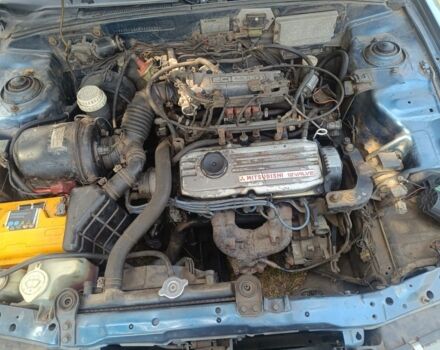 Синий Мицубиси Лансер, объемом двигателя 1.5 л и пробегом 450 тыс. км за 999 $, фото 8 на Automoto.ua