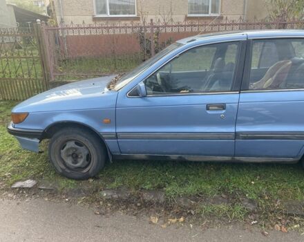 Синій Міцубісі Lancer, об'ємом двигуна 1.5 л та пробігом 330 тис. км за 1200 $, фото 1 на Automoto.ua
