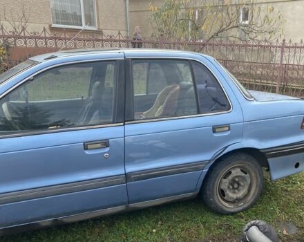 Синій Міцубісі Lancer, об'ємом двигуна 1.5 л та пробігом 330 тис. км за 1200 $, фото 2 на Automoto.ua