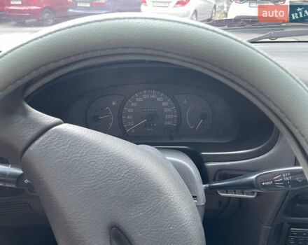 Синій Міцубісі Lancer, об'ємом двигуна 1.3 л та пробігом 367 тис. км за 1000 $, фото 3 на Automoto.ua