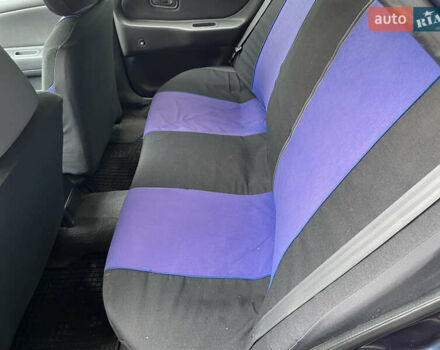 Синій Міцубісі Lancer, об'ємом двигуна 1.3 л та пробігом 367 тис. км за 1000 $, фото 12 на Automoto.ua