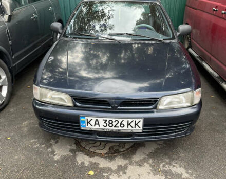 Синій Міцубісі Lancer, об'ємом двигуна 1.3 л та пробігом 367 тис. км за 1000 $, фото 11 на Automoto.ua