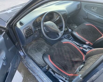 Синий Мицубиси Лансер, объемом двигателя 1.3 л и пробегом 250 тыс. км за 800 $, фото 8 на Automoto.ua