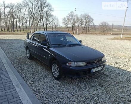 Синій Міцубісі Lancer, об'ємом двигуна 1.3 л та пробігом 380 тис. км за 1900 $, фото 5 на Automoto.ua