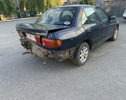 Синий Мицубиси Лансер, объемом двигателя 1.3 л и пробегом 250 тыс. км за 800 $, фото 6 на Automoto.ua