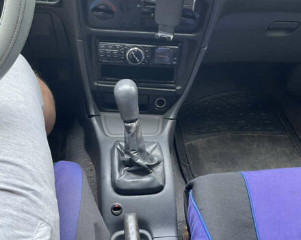 Синій Міцубісі Lancer, об'ємом двигуна 1.3 л та пробігом 367 тис. км за 1000 $, фото 5 на Automoto.ua