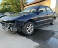 Синий Мицубиси Лансер, объемом двигателя 1.3 л и пробегом 250 тыс. км за 800 $, фото 2 на Automoto.ua