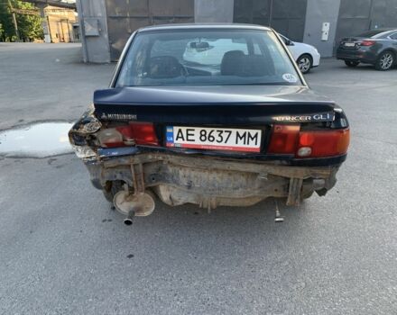 Синий Мицубиси Лансер, объемом двигателя 1.3 л и пробегом 250 тыс. км за 800 $, фото 5 на Automoto.ua