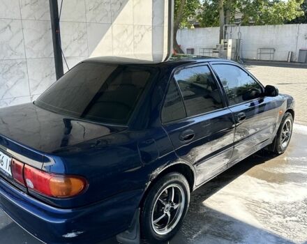 Синій Міцубісі Lancer, об'ємом двигуна 1.3 л та пробігом 3 тис. км за 1600 $, фото 4 на Automoto.ua