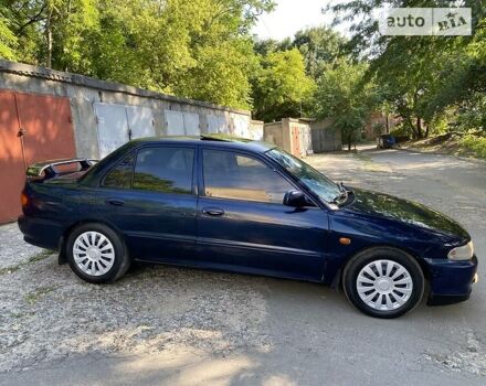 Синій Міцубісі Lancer, об'ємом двигуна 1.6 л та пробігом 300 тис. км за 2100 $, фото 3 на Automoto.ua