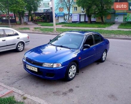 Синий Мицубиси Лансер, объемом двигателя 1.3 л и пробегом 270 тыс. км за 2100 $, фото 1 на Automoto.ua