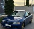 Синий Мицубиси Лансер, объемом двигателя 1.3 л и пробегом 100 тыс. км за 402 $, фото 1 на Automoto.ua