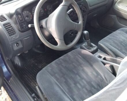 Синий Мицубиси Лансер, объемом двигателя 1.3 л и пробегом 3 тыс. км за 1399 $, фото 3 на Automoto.ua