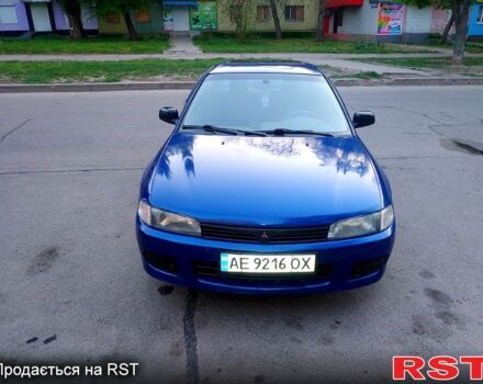 Синий Мицубиси Лансер, объемом двигателя 1.3 л и пробегом 270 тыс. км за 2100 $, фото 1 на Automoto.ua
